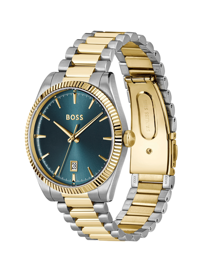 BOSS Cheswick watch with a steel and gold tone bracelet and blue dial on a white background.