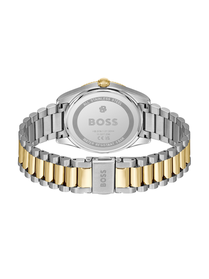 BOSS Cheswick watch with a steel and gold tone bracelet and blue dial on a white background.
