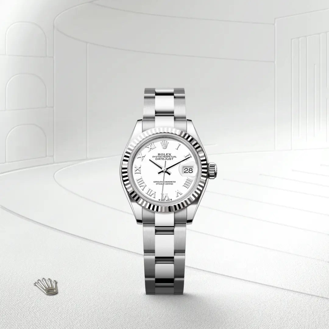 Rolex Lady-Datejust with a steel Oyster bracelet, fluted bezel and white dial on a grey lined background.