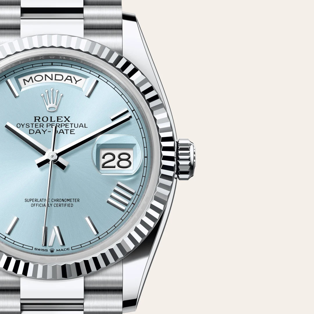 Rolex Day-Date watch with an ice blue dial on a light beige background.