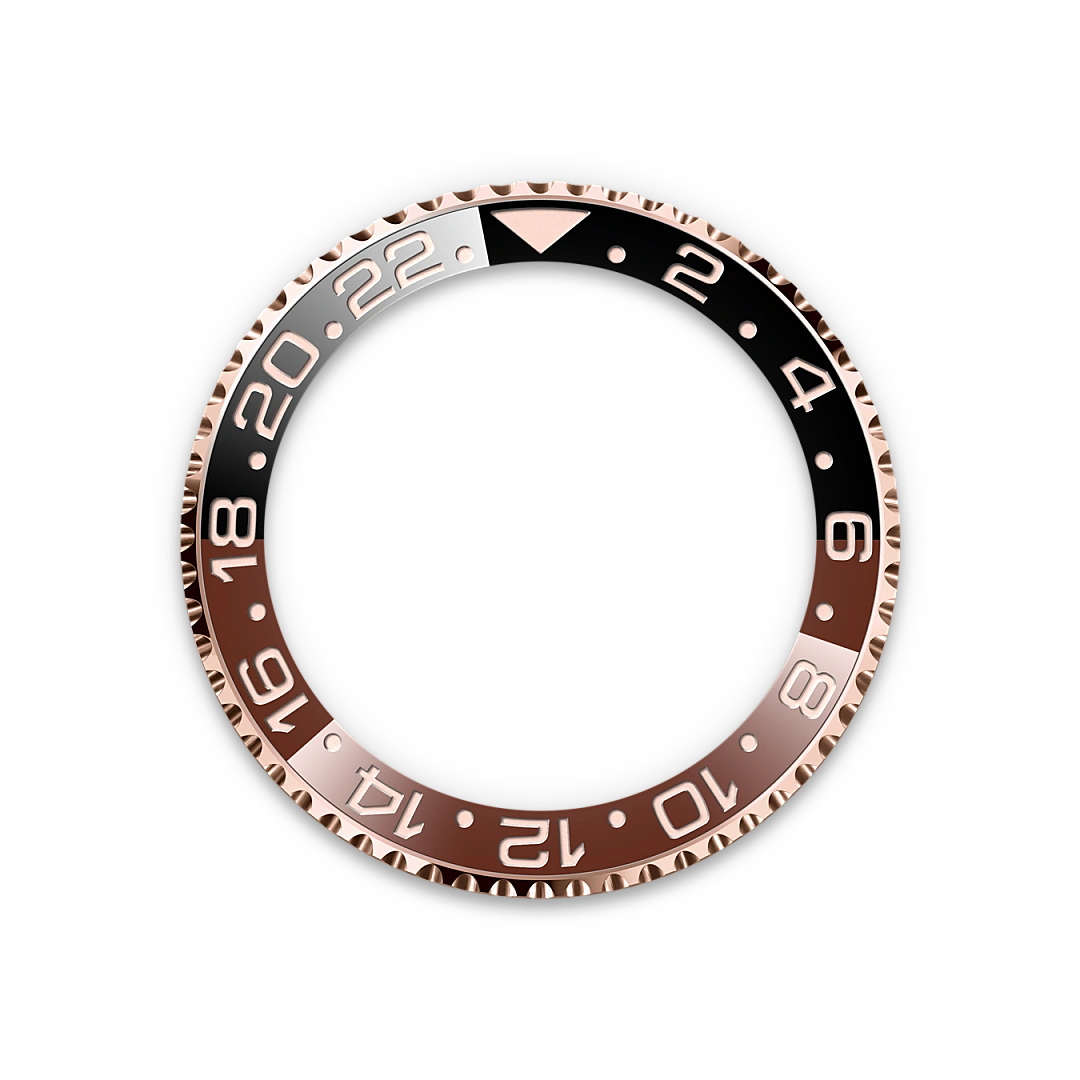 Rose-gold, black and brown Rolex GMT-Master II bezel on a transparent background.