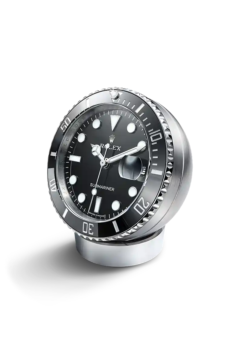 Rolex Submariner Date desk clock on a white background.