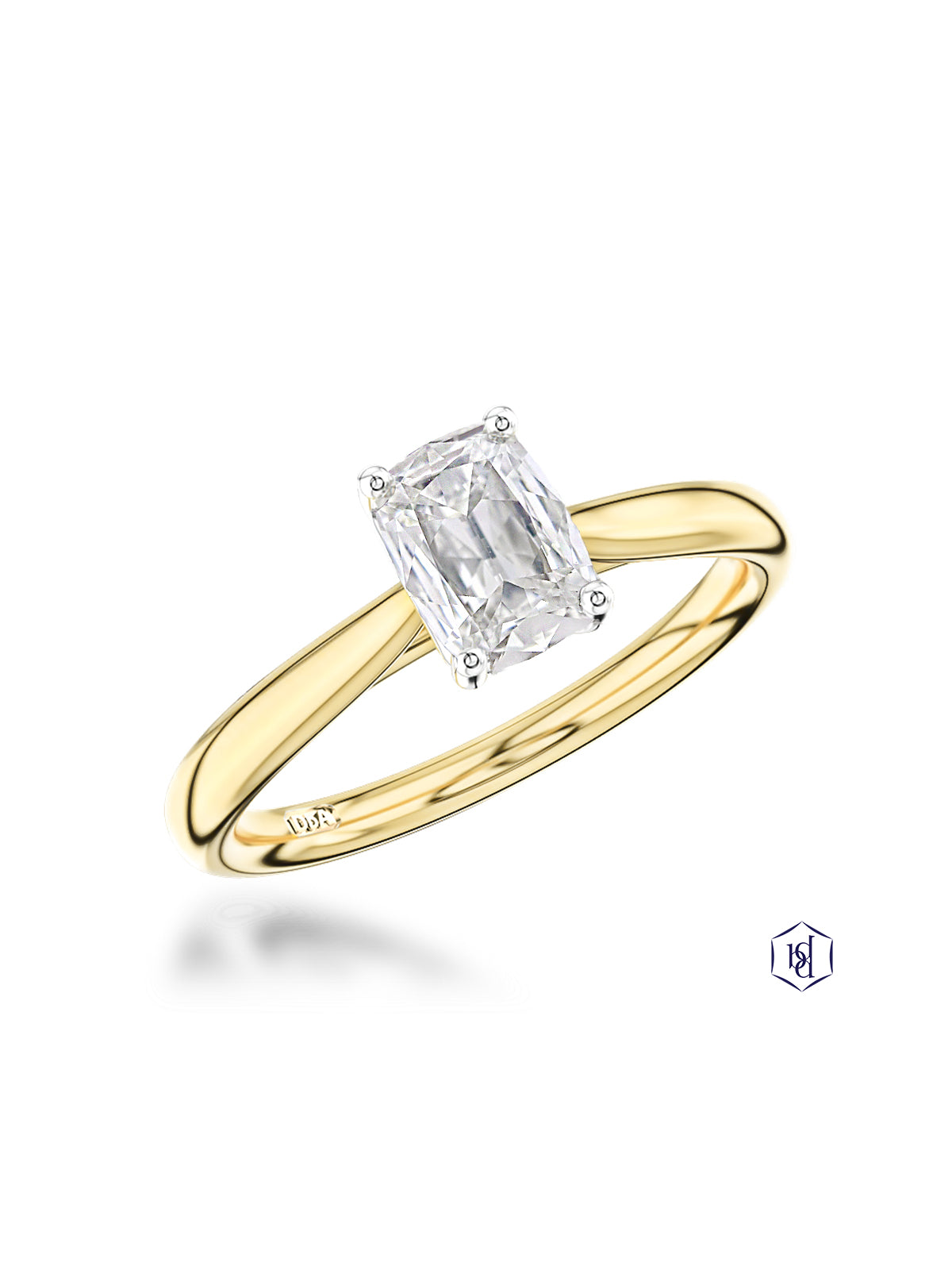 Cushion-cut diamond solitaire ring with a yellow-gold band on a white background.