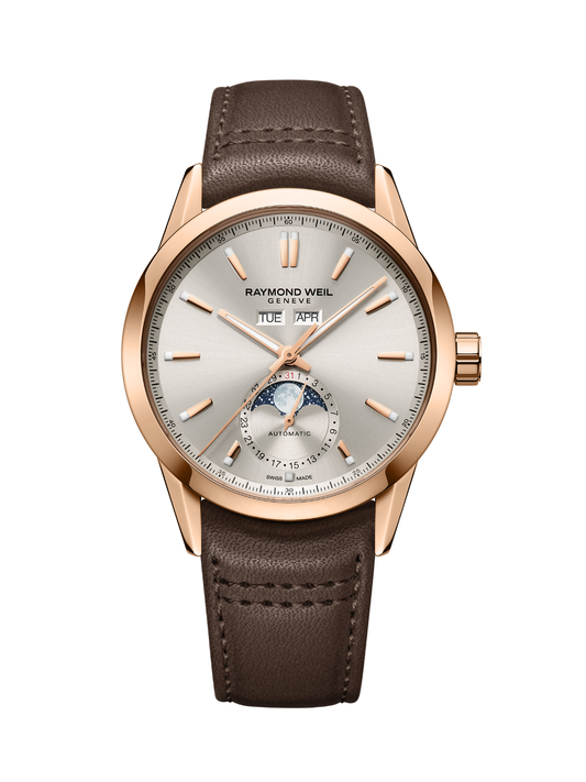 Raymond Weil Freelancer Complete Calendar watch with rose-gold case, brown leather strap and silver dial on a white background.
