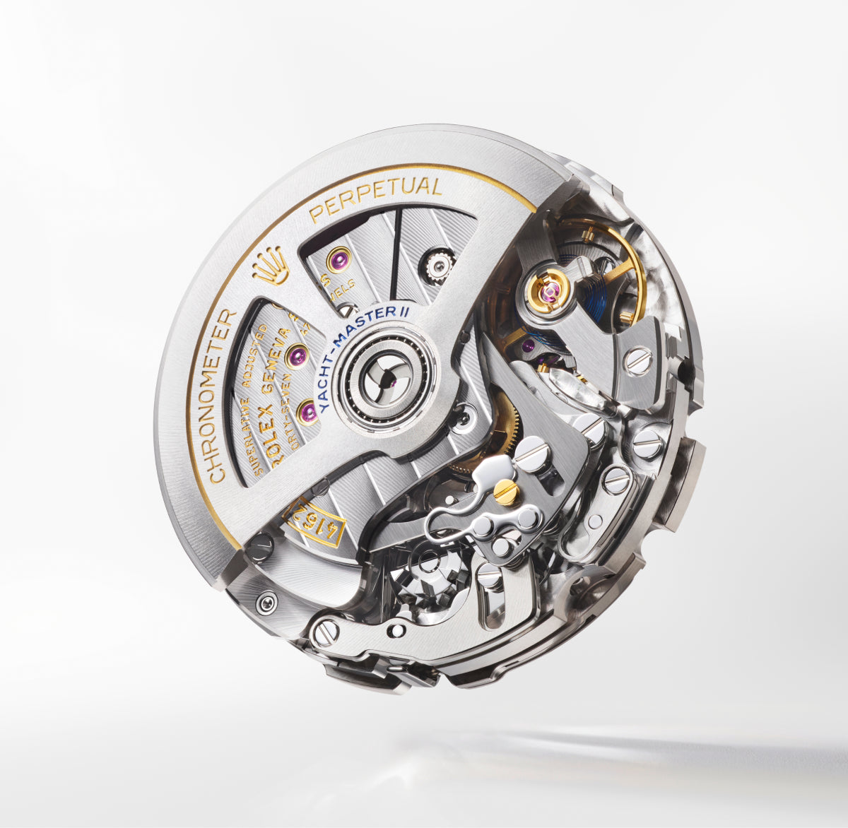 Close-up of Rolex movement 4162 on a light background.