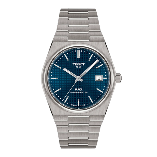 Tissot PRX Titanium with titanium bracelet and blue dial on a white background.