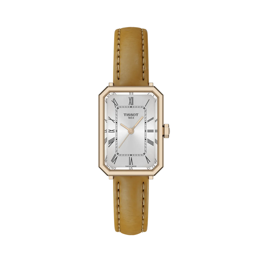 Tissot SRV with rose gold PVD case, brown leather strap and silver dial on a white background.