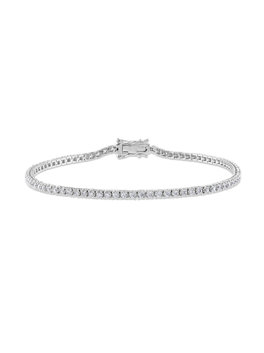 White-gold diamond tennis bracelet on a white background.
