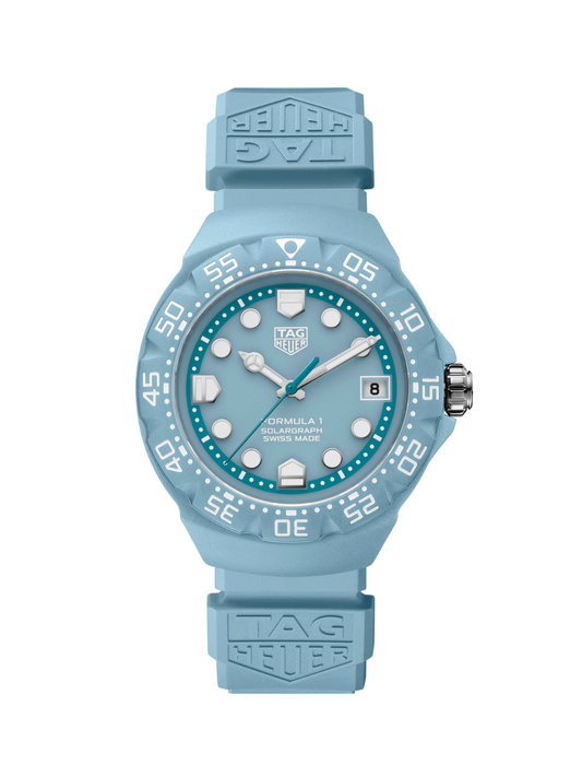 TAG Heuer Formula 1 watch with pastel blue case, rubber strap and dial, on a white background.