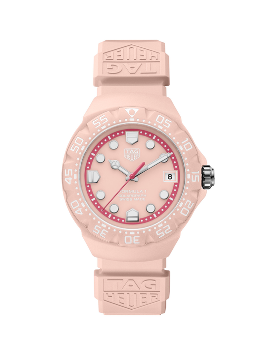 TAG Heuer Formula 1 watch with pastel blue case, rubber strap and dial, on a white background.