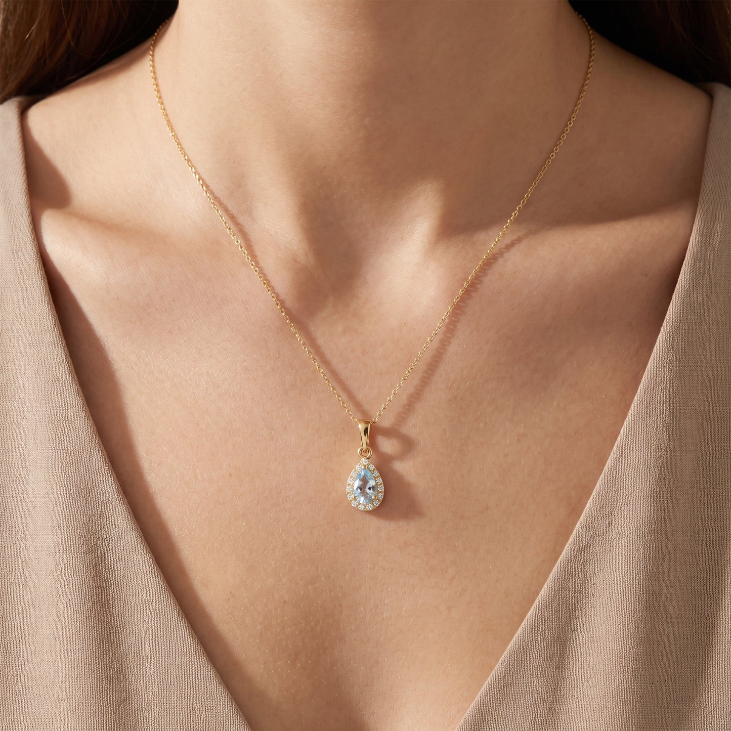 Aquamarine & Diamond Cluster Pendant with 0.19ct Pear Cut Aquamarine and 0.04ct Diamond Halo in 18ct Yellow Gold