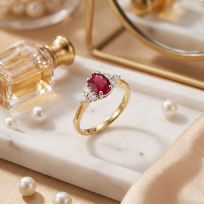 Ruby & Diamond Trefoil Ring with 7x5mm Ruby and 0.22ct of Round Brilliant Diamonds in 9ct Yellow & White Gold