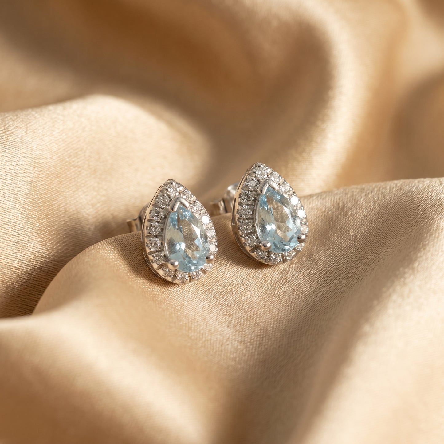 Aquamarine & Diamond Cluster Earrings with 0.36ct Pear Cut Aquamarine & 0.10ct Round Brilliant Diamond Halo in 18ct White Gold