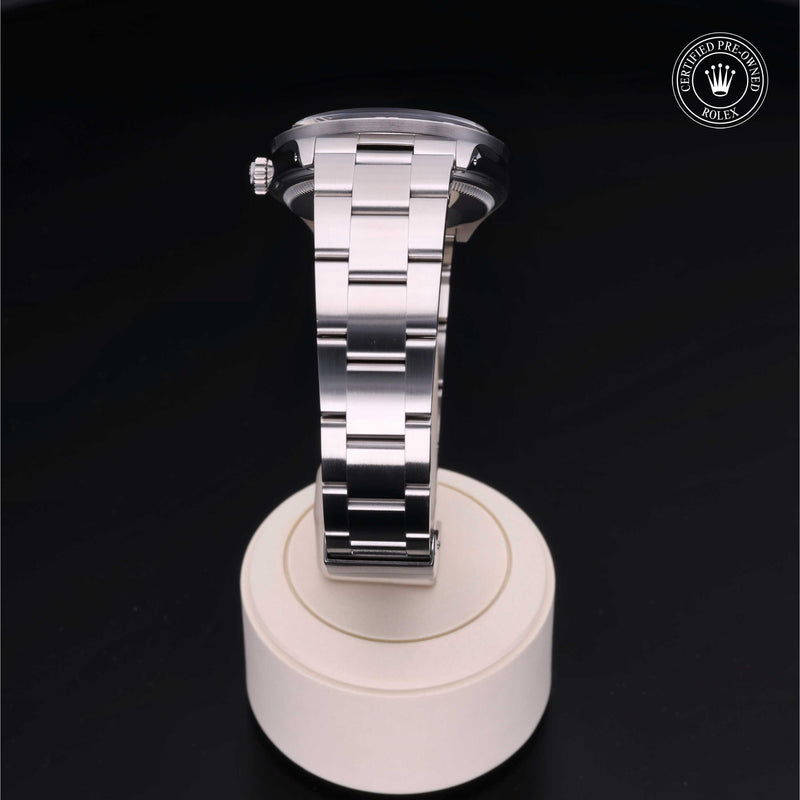 Rolex Date 34 with steel Oyster bracelet and silver dial on a black background.Date 34