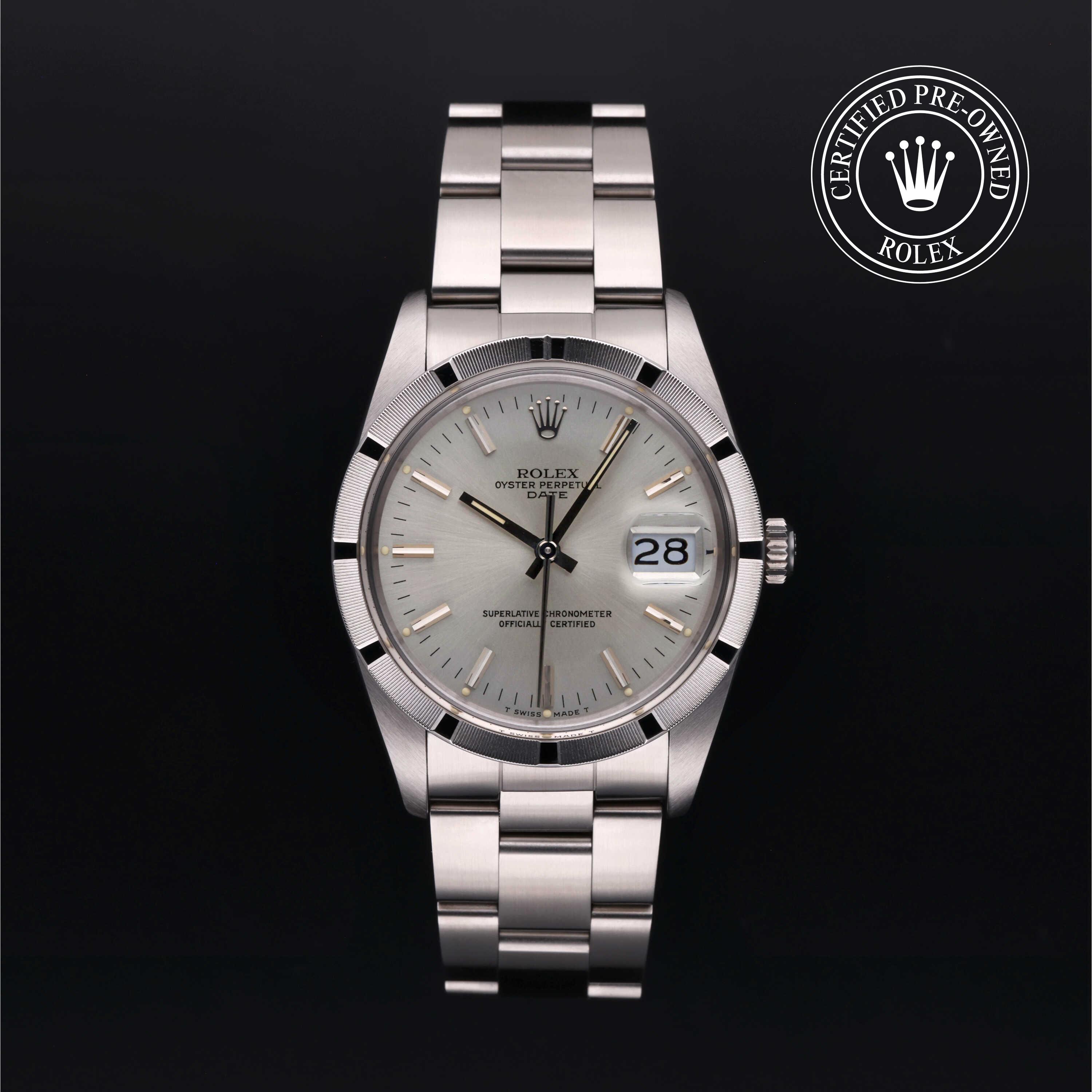 Rolex Date 34 with steel Oyster bracelet and silver dial on a black background.