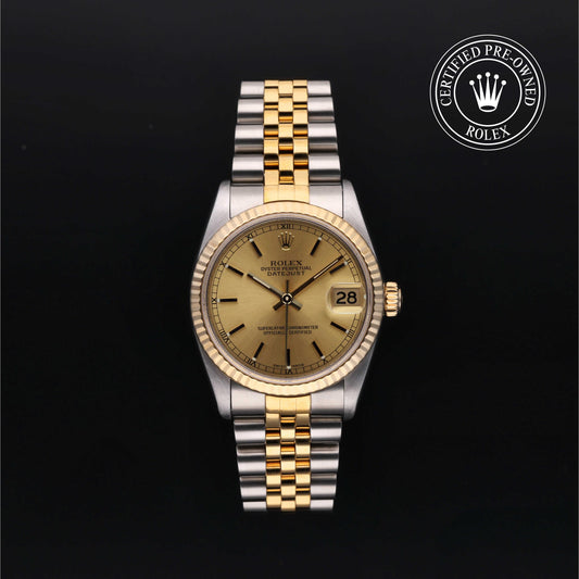 Rolex Datejust 31 with steel & yellow-gold Jubilee bracelet and champagne dial, on a black background with CPO logo.