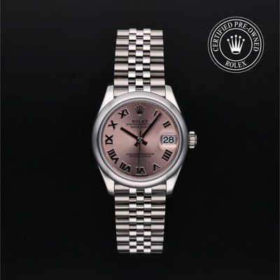 Rolex Datejust watch with a steel Jubilee bracelet and pink dial on a black background.
