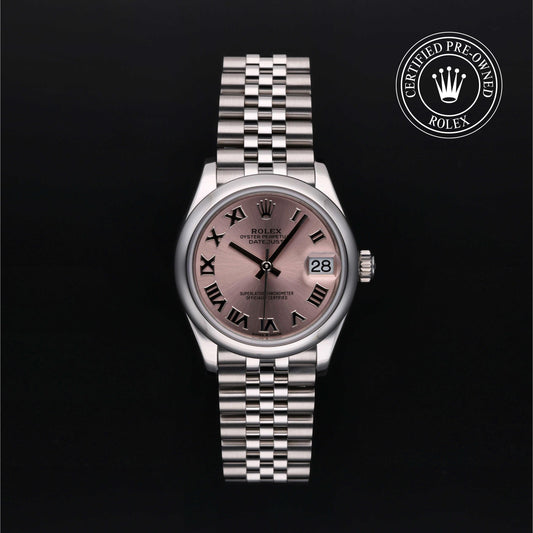 Rolex Datejust watch with a steel Jubilee bracelet and pink dial on a black background.