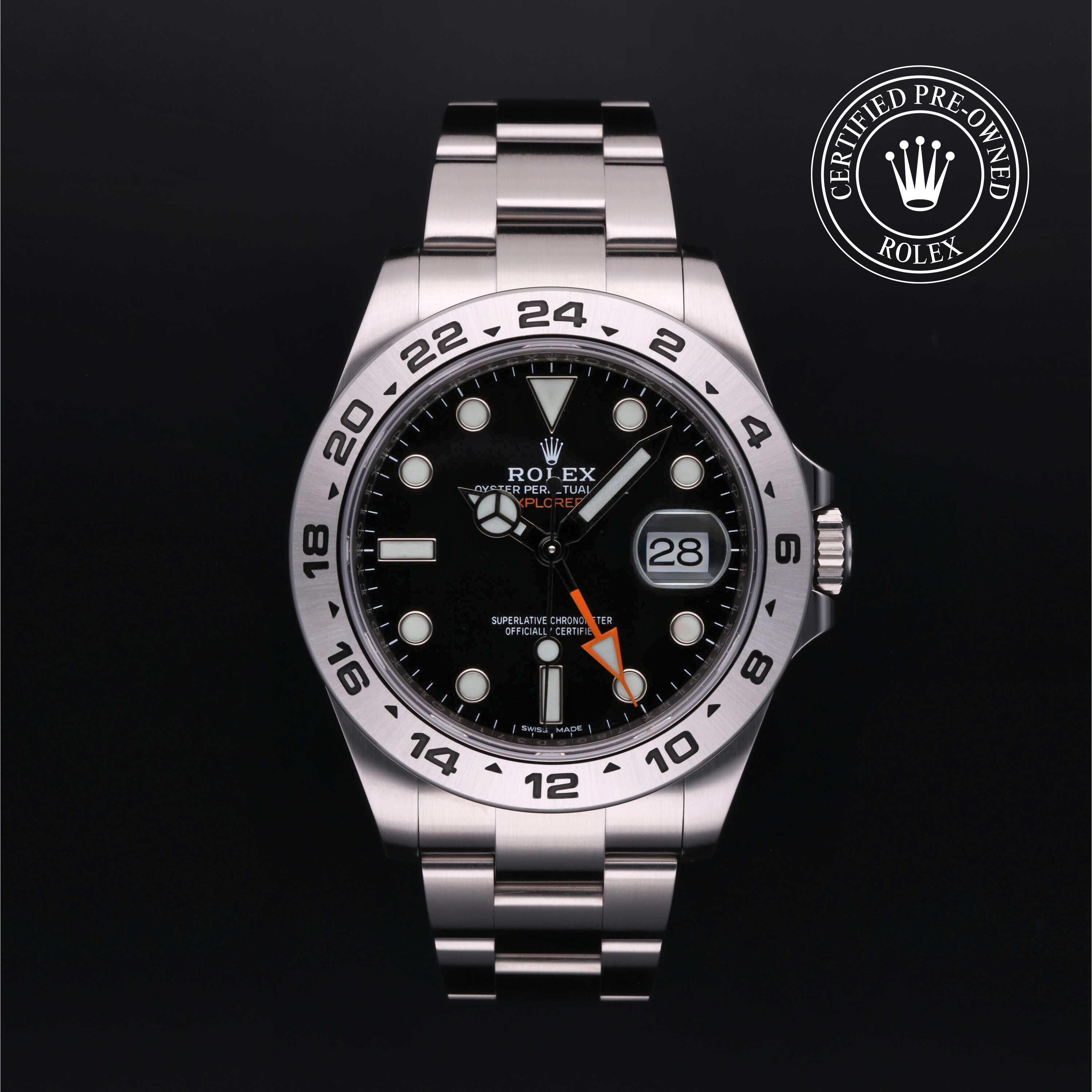 Rolex Explorer II with steel Oyster bracelet and black dial, on a black background with CPO logo.