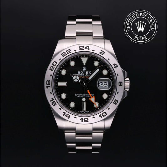 Rolex Explorer II with steel Oyster bracelet and black dial, on a black background with CPO logo.