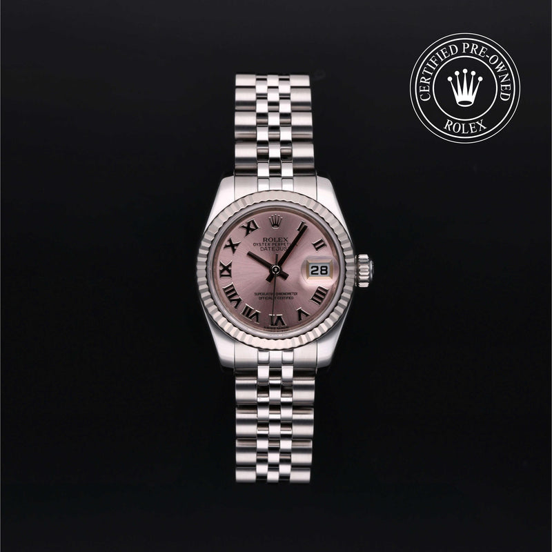 Rolex Lady-Datejust watch with a steel Jubilee bracelet and pink dial on a black background.