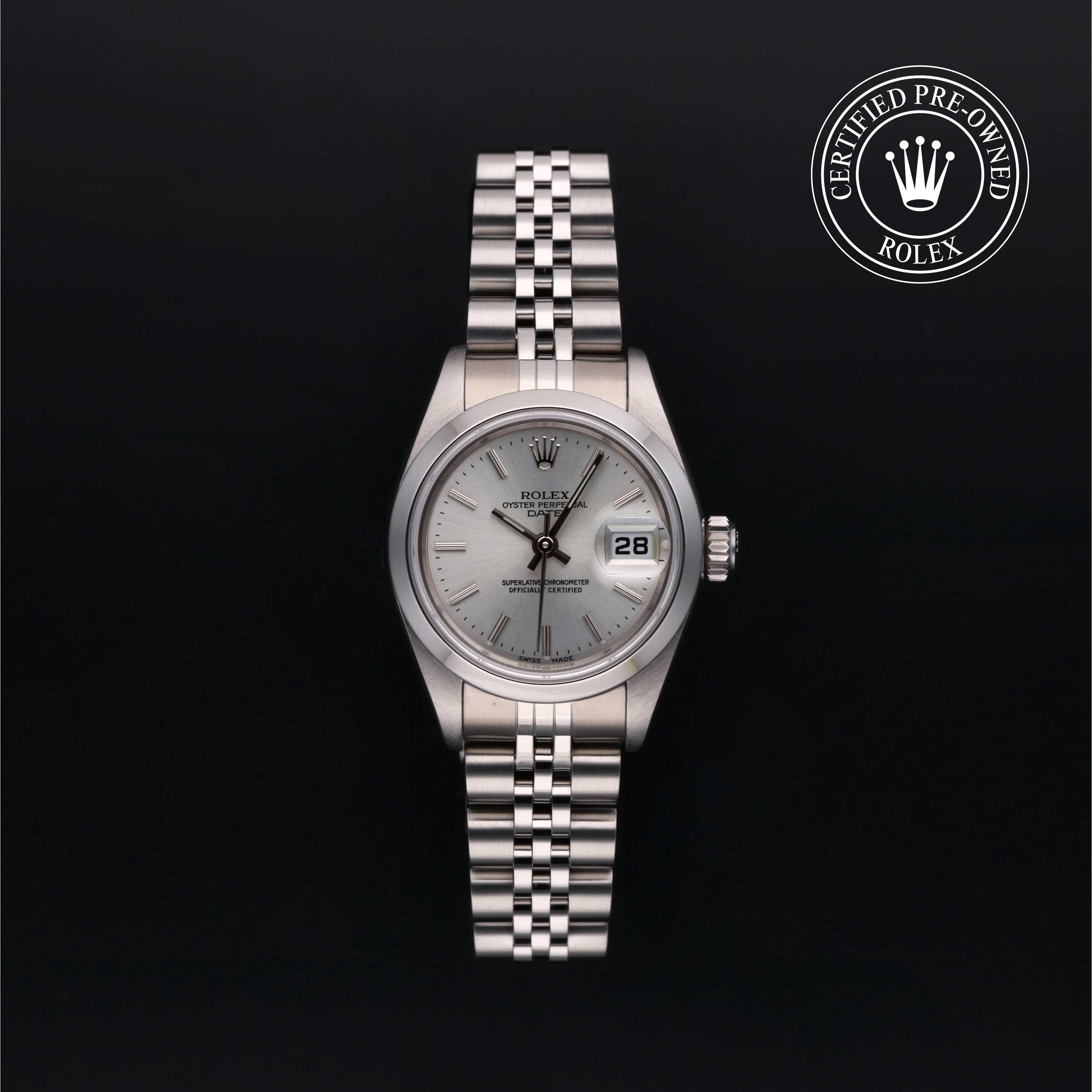 Rolex Lady-Datejust with steel Jubilee bracelet and silver dial on a black background.