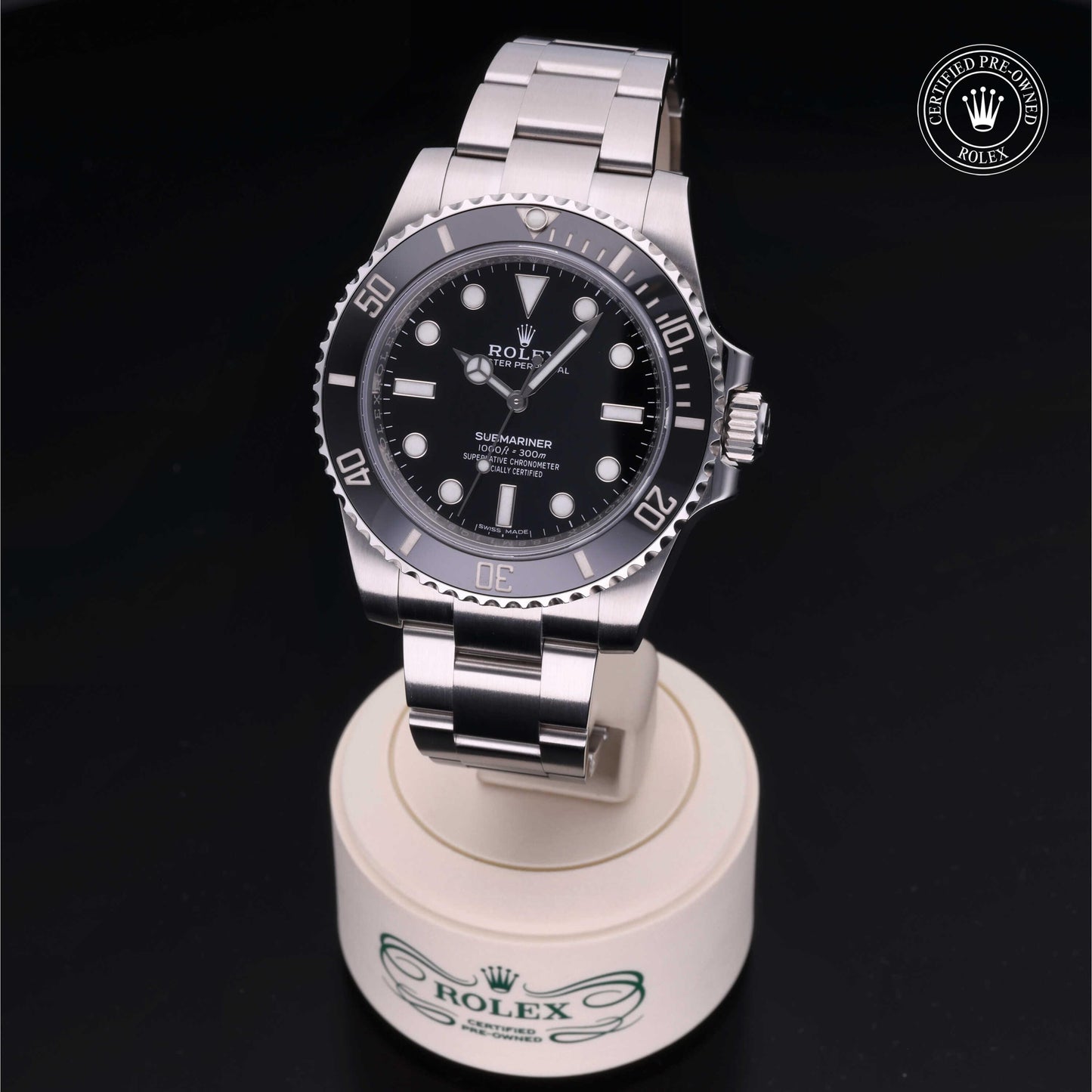 Rolex Submariner watch with steel Oyster bracelet and black dial on a white background.