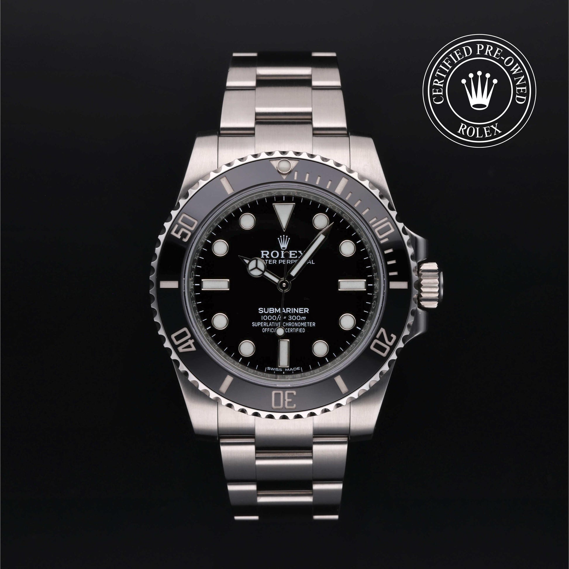 Rolex Submariner watch with steel Oyster bracelet and black dial on a white background.