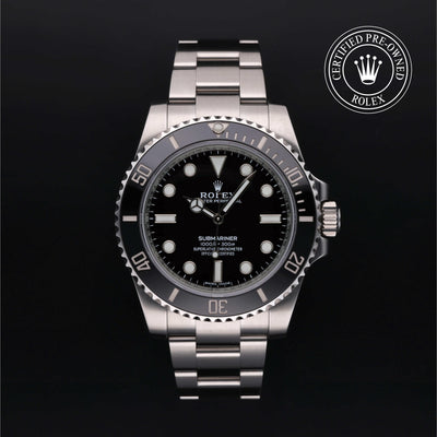 Rolex Submariner watch with steel Oyster bracelet and black dial on a white background.