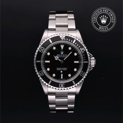 Rolex Submariner watch with black dial and Oyster bracelet on a black background, featuring a 'Certified Pre-Owned Rolex' label.