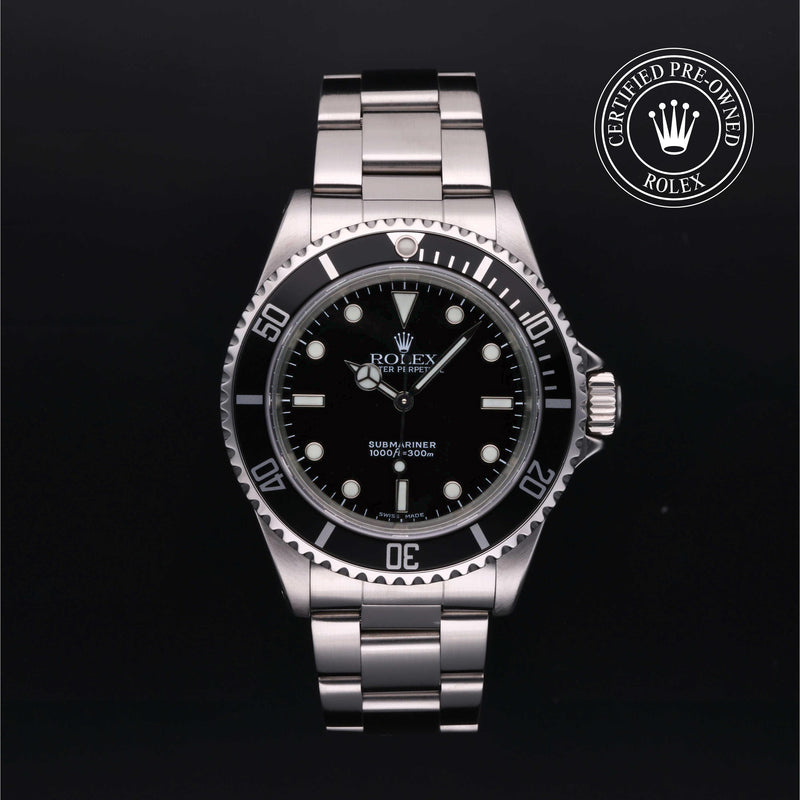 Rolex Submariner watch with black dial and Oyster bracelet on a black background, featuring a 'Certified Pre-Owned Rolex' label.