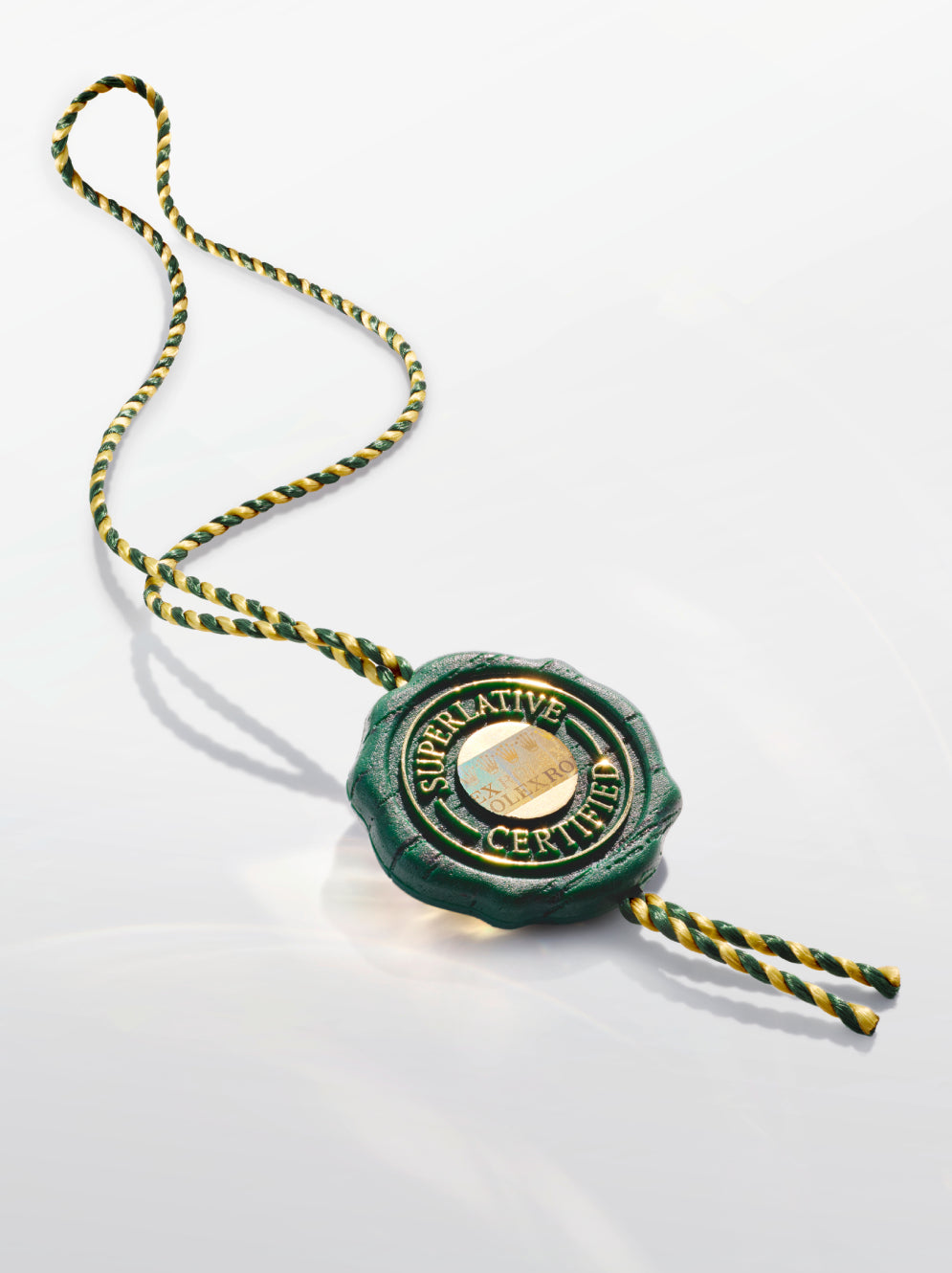 Rolex Superlative Certified green and gold seal on a white background.