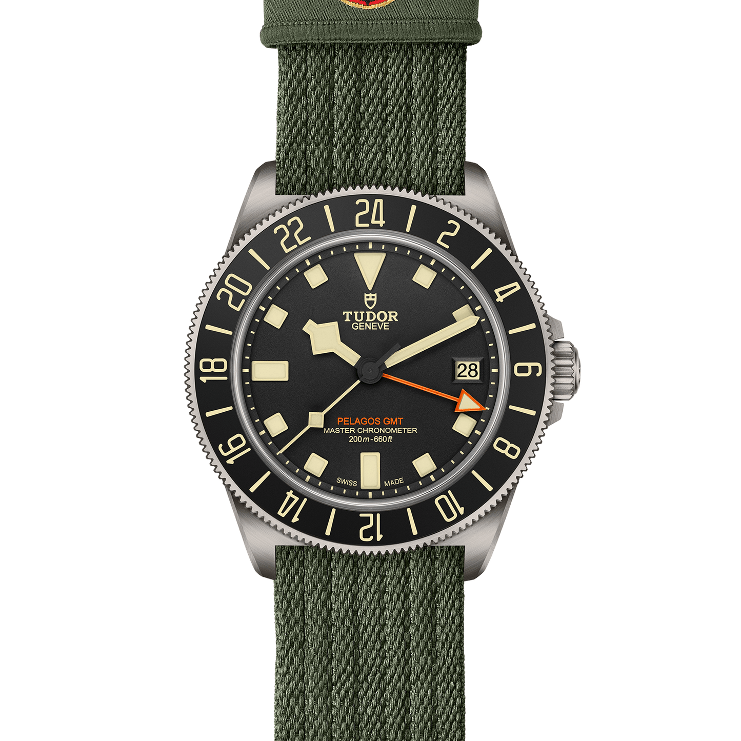 TUDOR Pelagos FXD GMT with 42mm titanium case, green fabric strap and black dial on a white background.