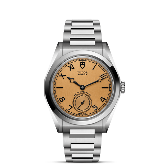 Tudor Monarch watch with steel bracelet and champagne dial on a white background.