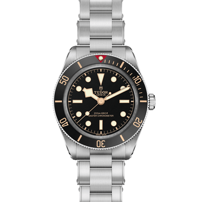 Tudor Black Bay 58 watch with a steel bracelet and black dial on a white background.