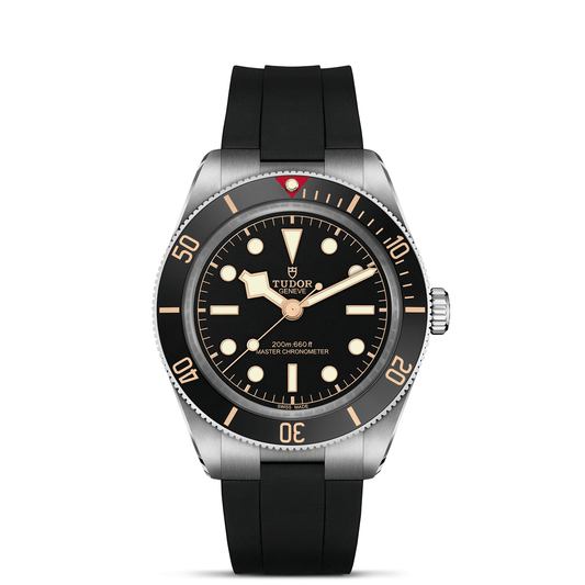 Tudor Black Bay 58 watch with a black rubber strap and black dial on a white background.