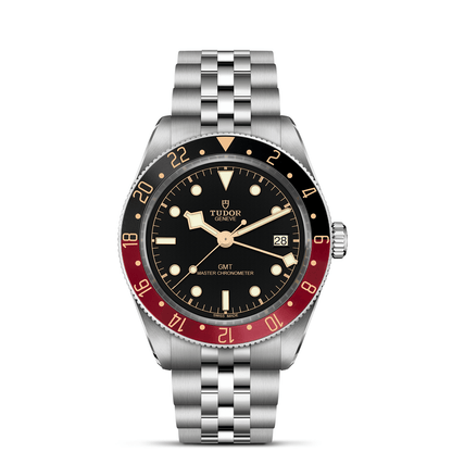 Tudor Black Bay 58 GMT watch with a steel bracelet and black dial on a white background.