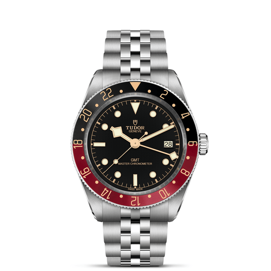 Tudor Black Bay 58 GMT watch with a steel bracelet and black dial on a white background.