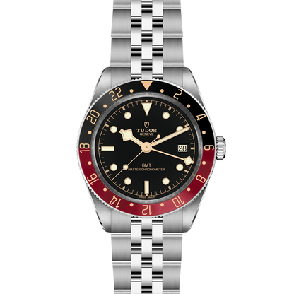 Tudor Black Bay 58 GMT watch with a steel bracelet and black dial on a white background.
