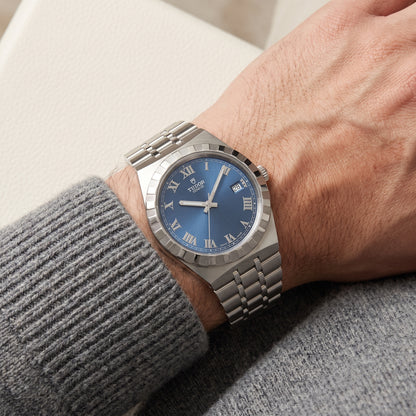 TUDOR Royal with steel bracelet and blue dial on a gents wrist.