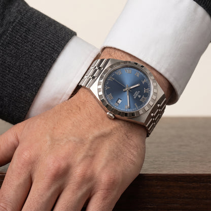TUDOR Royal with steel bracelet and blue dial on a gents wrist.