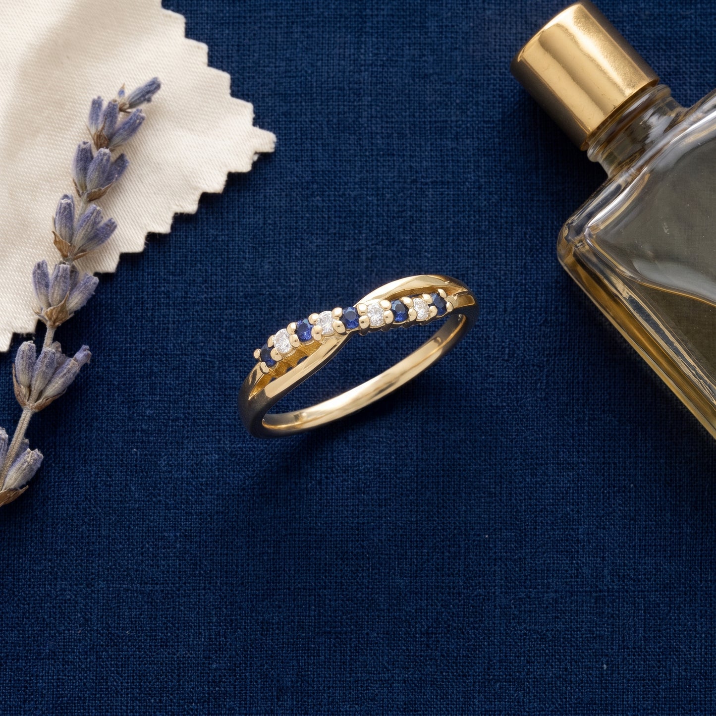 Sapphire & Diamond Crossover Half Eternity Ring with 0.10ct of Round Brilliant Diamonds in 9ct Yellow Gold