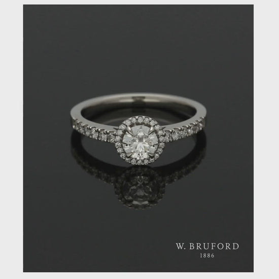 Diamond Halo Engagement Ring 0.50ct Certificated Round Brilliant Cut in Platinum with Diamond Shoulders