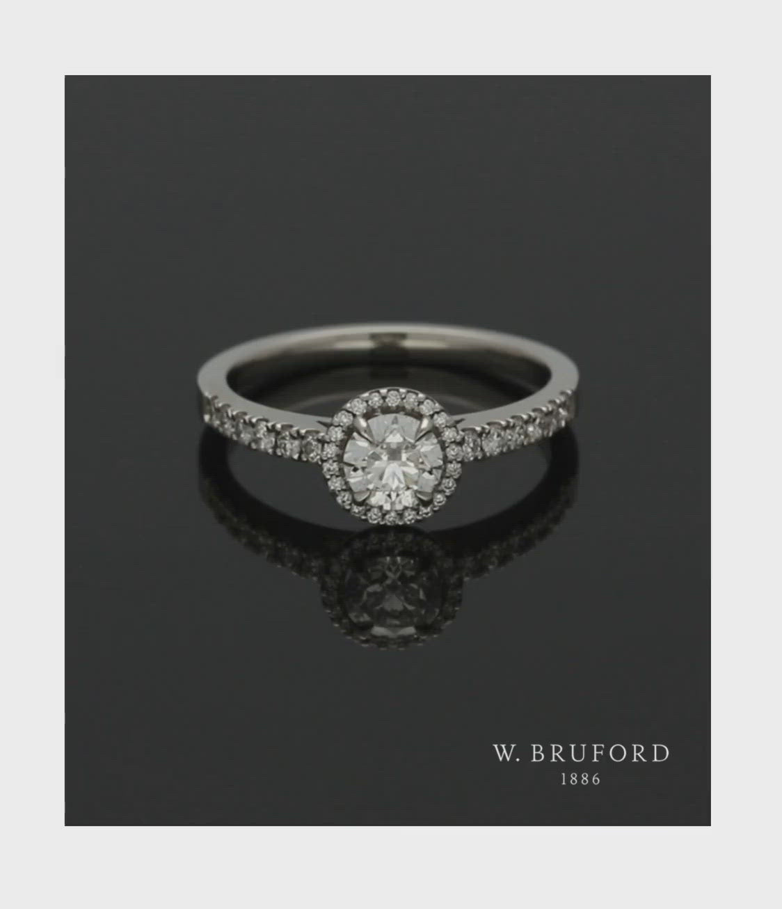 Diamond Halo Engagement Ring 0.50ct Certificated Round Brilliant Cut in Platinum with Diamond Shoulders