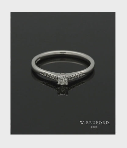 Diamond Solitaire Engagement Ring 0.21ct Round Brilliant Cut in 18ct White Gold with Diamond Shoulders