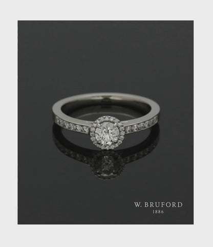 Diamond Halo Engagement Ring 0.33ct Certificated Round Brilliant Cut in Platinum with Diamond Shoulders
