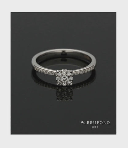 Diamond Cluster Ring 0.18ct Round Brilliant Cut in 18ct White Gold with Diamond Shoulders
