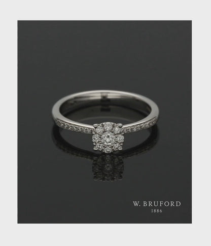 Diamond Cluster Ring 0.25ct Round Brilliant Cut in 18ct White Gold with Diamond Shoulders